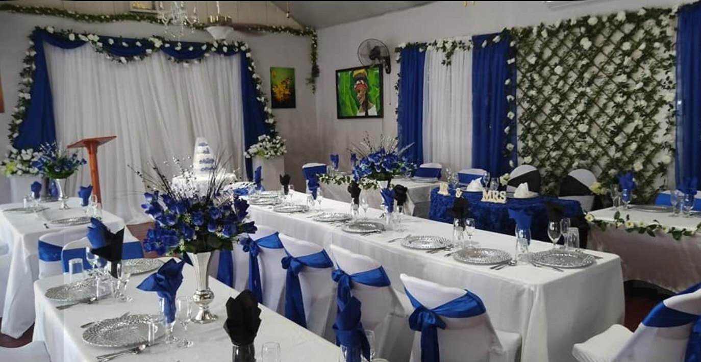 Royal blue and white wedding banquet hall styled by El Gazebo's Paradise Garden Restaurant & Grill